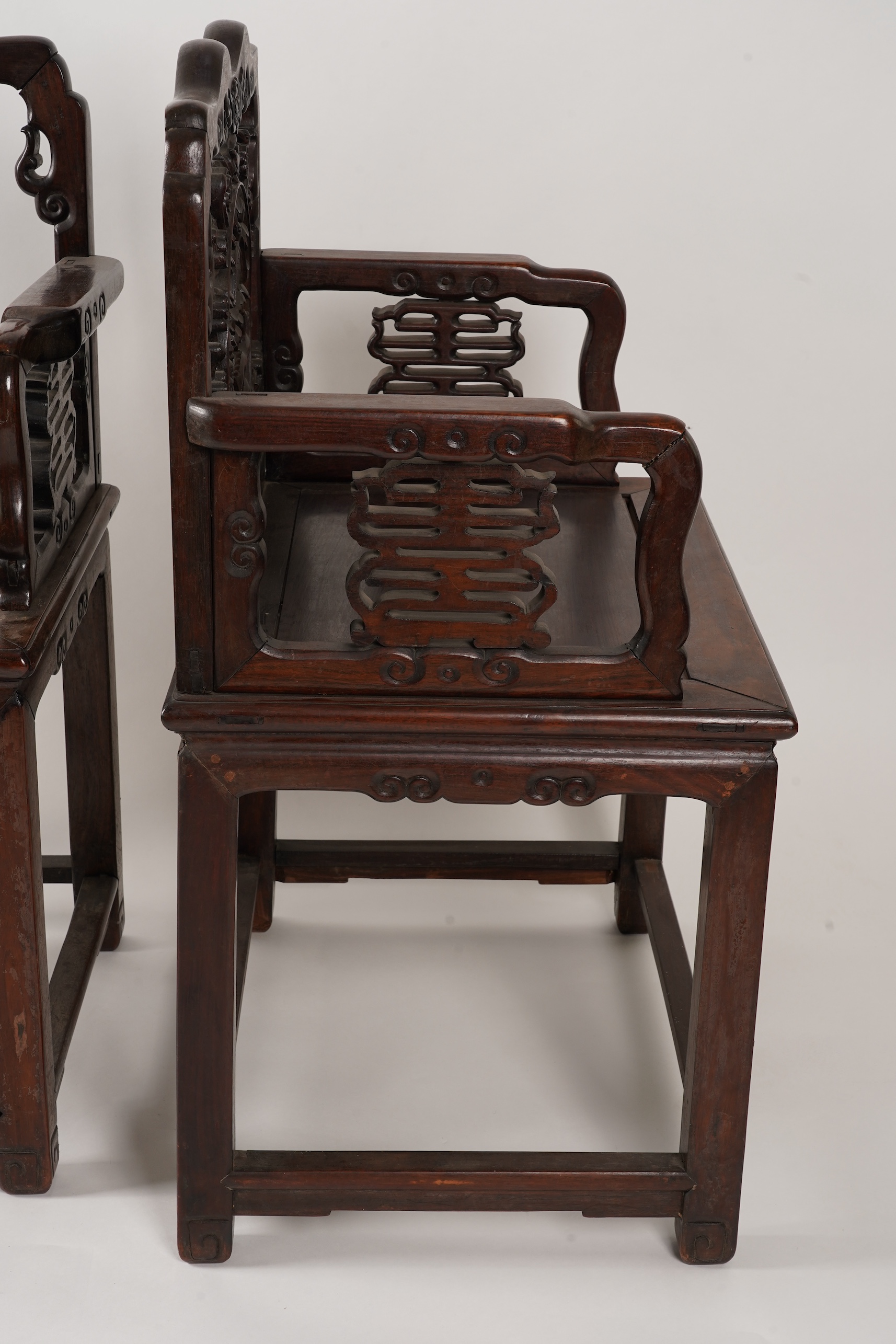 A pair of Chinese hongmu armchairs, late 19th century